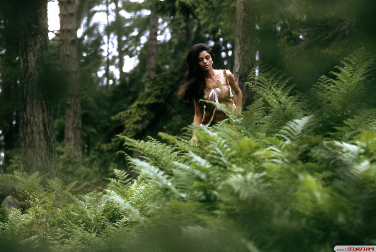15P Brunette chick in Wildling attire is caught masturbating in nature