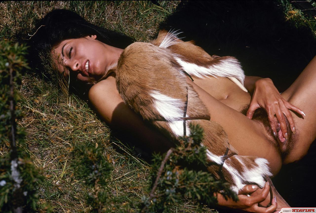 15P Brunette chick in Wildling attire is caught masturbating in nature