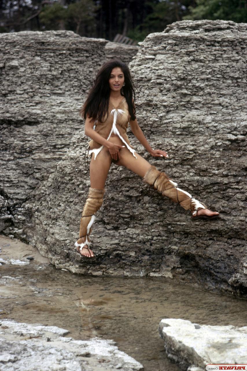 15P Brunette chick in Wildling attire is caught masturbating in nature