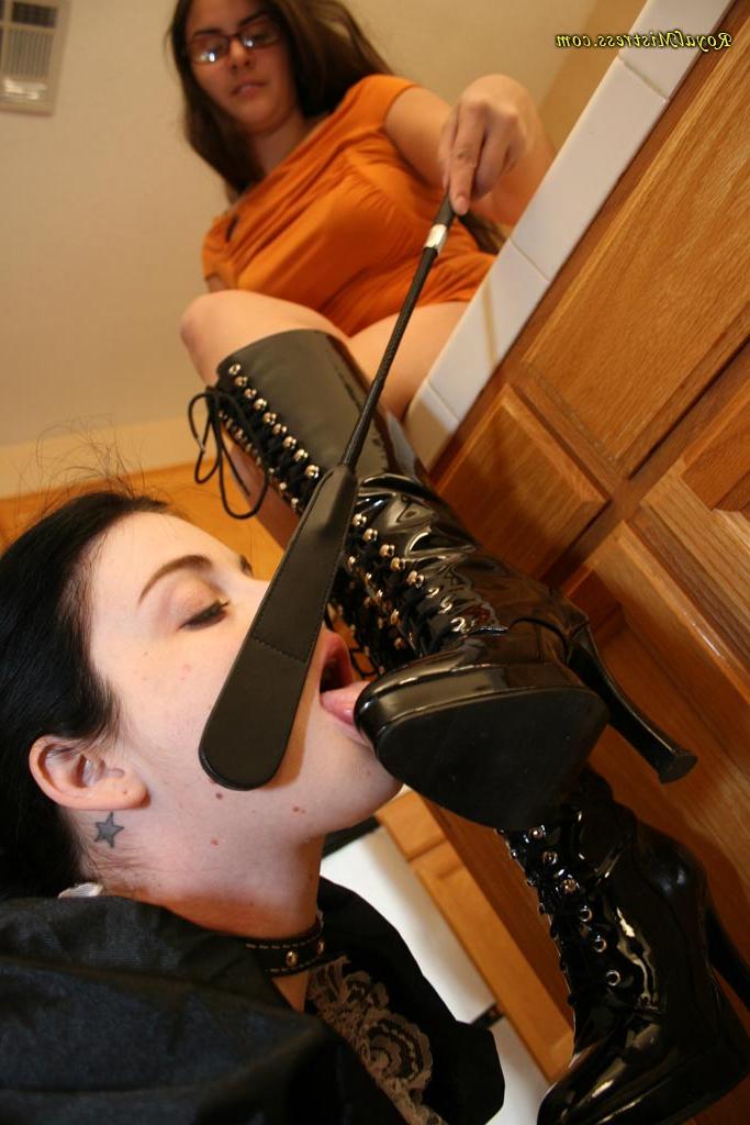 12P Dark haired maid is humiliated before licking her mistress's black boots