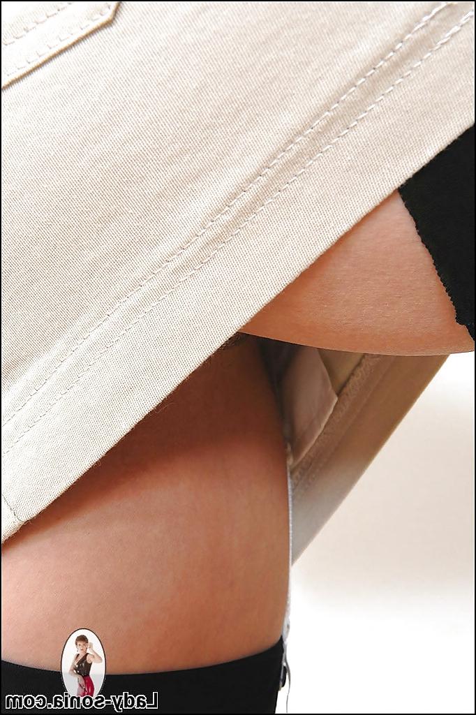 15P Lusty mature babe in stockings doing upskirt and exposing her hairy cunt