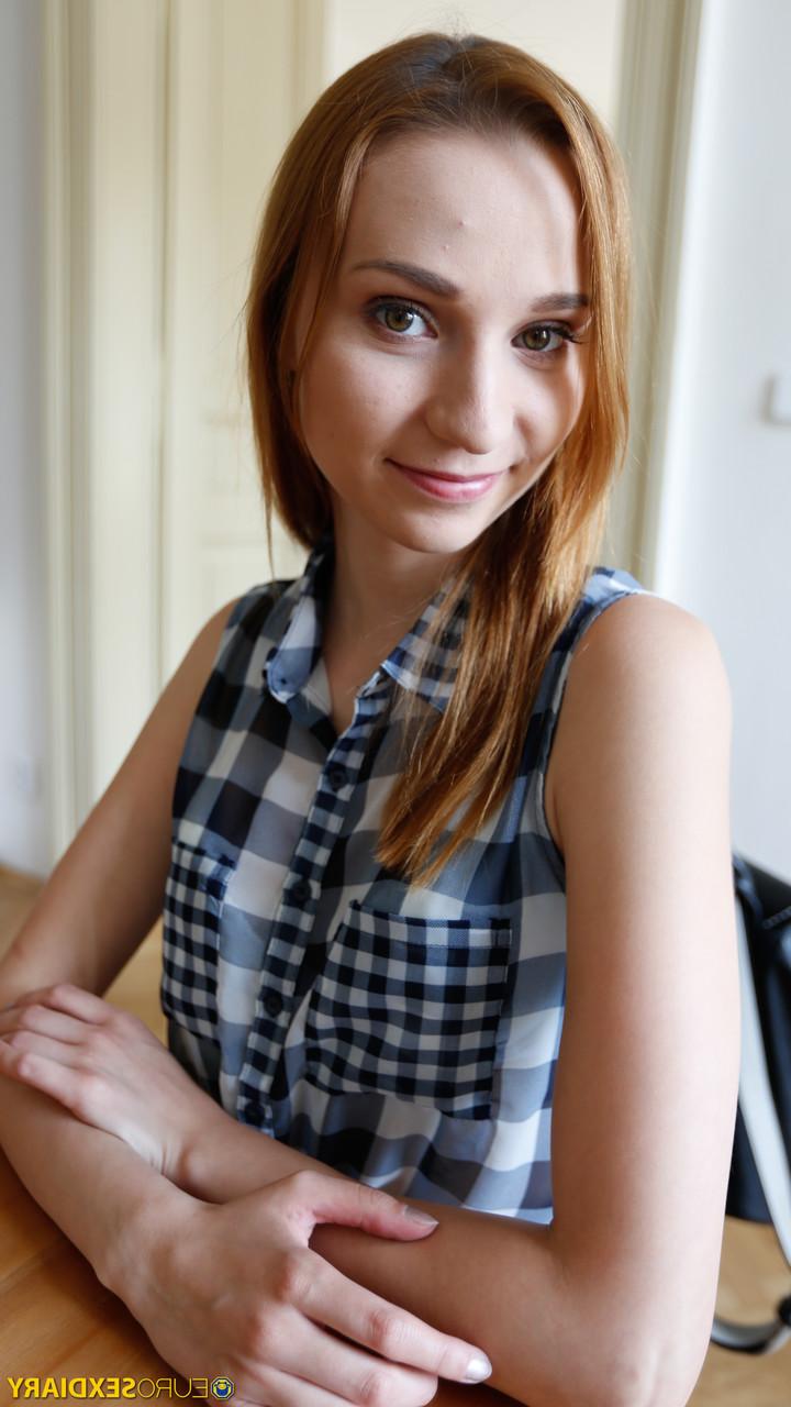 20P Sexy redhead Radka shows off her petite body while stripping for some POV sex