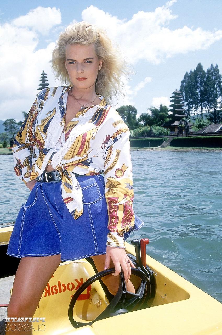 12P Busty blonde gets involved in a double penetration on top of a paddle boat