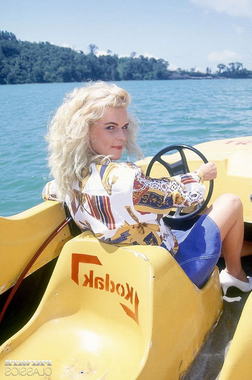 12P Busty blonde gets involved in a double penetration on top of a paddle boat